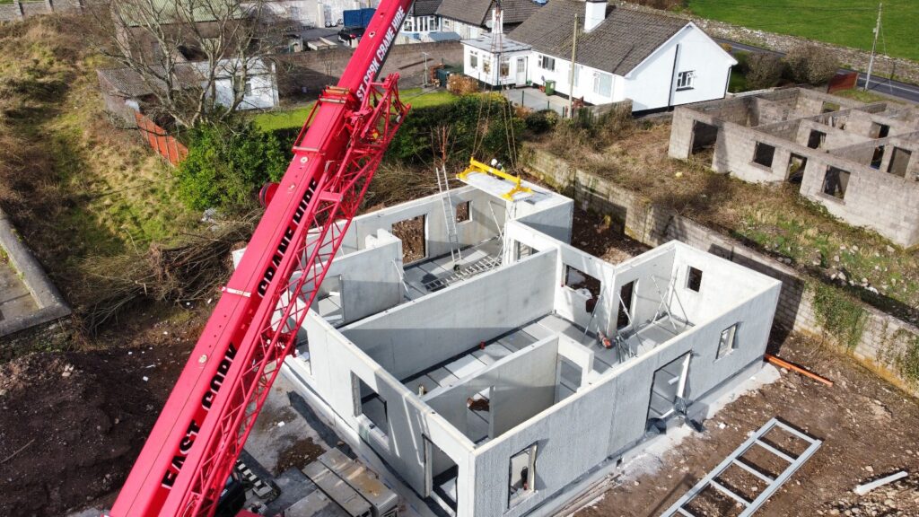Crane erecting modular homes in Cork