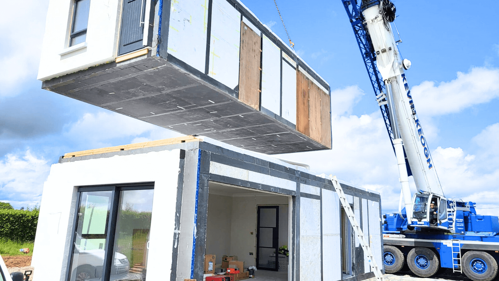 Lifting the modular home into position